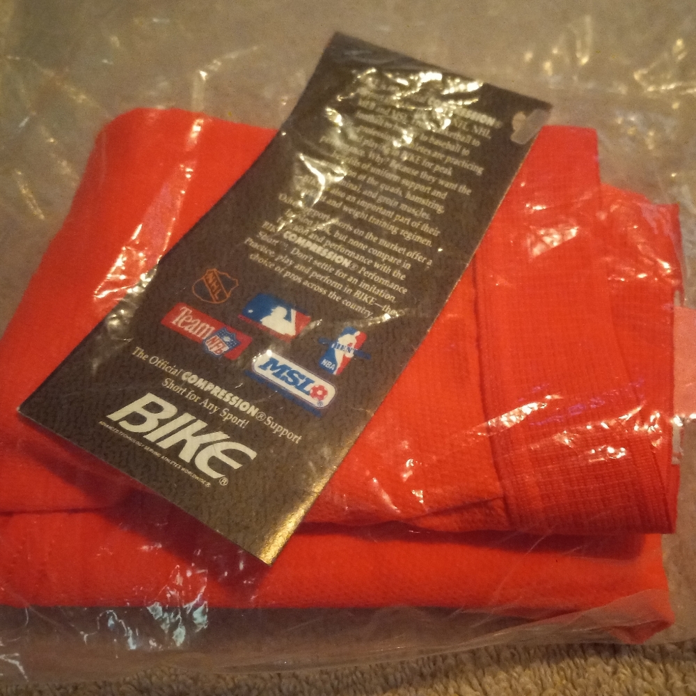 Men's Orange, Bike compression shorts.Size Small